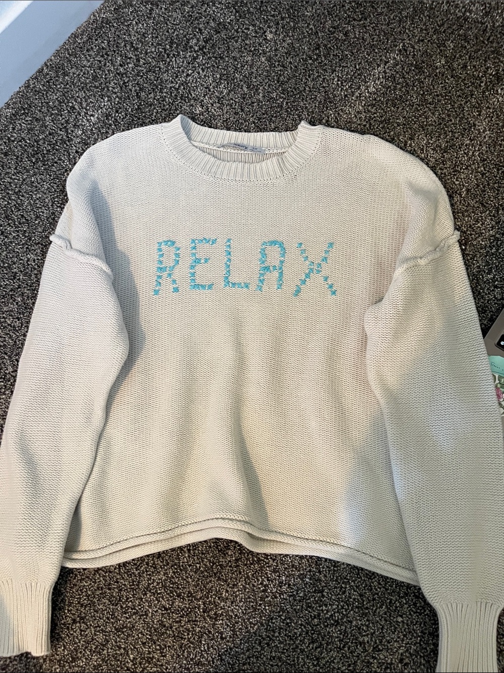 Subtle Luxury Cream Crewneck Sweater with Turquoise 'RELAX' Knit